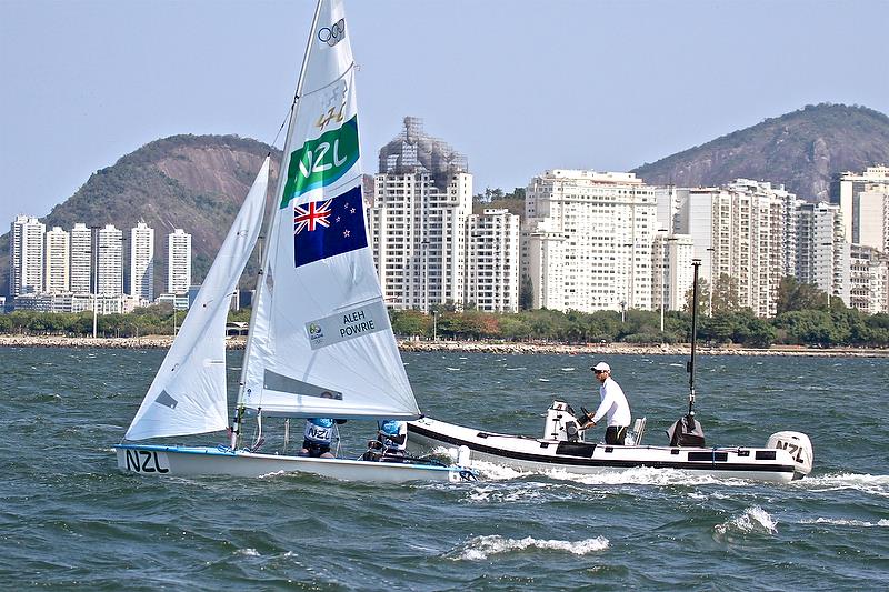 Coach Nathan Handley gives 2016 Olympic Silver Medalists Jo Aleh and Polly Powrie the latest wind information off WindBot before the start of the Medal Race at the 2016 Olympic Regatta photo copyright Richard Gladwell taken at  and featuring the 470 class