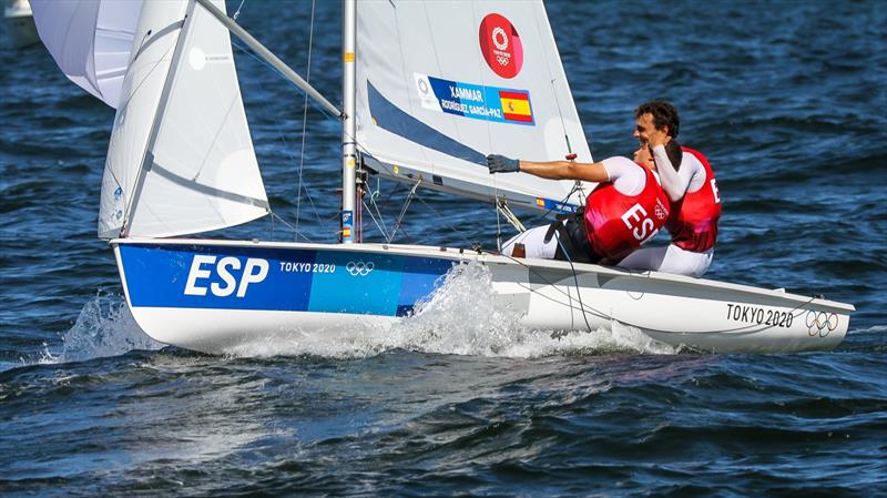 Celebrations start early on the Bronze medal winner (ESP) before the finish oif the Mens 470 Medal race - Tokyo2020 - Day 10 - August 4, , Enoshima, Japan photo copyright Richard Gladwell - Sail-World.com / nz taken at  and featuring the 470 class