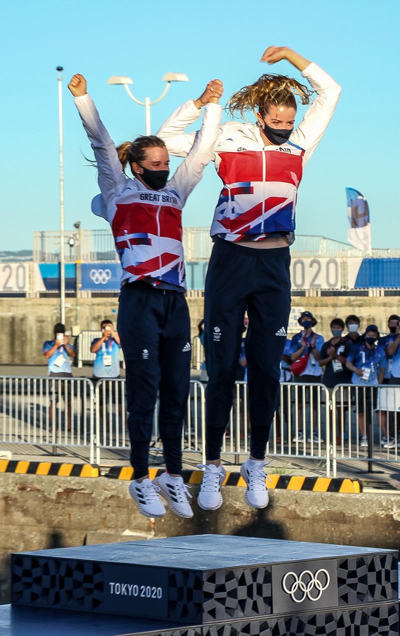 Hannah Mills and Eilidh McIntyre (GBR) leap for joy on the podium - Tokyo2020 - Day 10 - August 4, , Enoshima, Japan photo copyright Richard Gladwell - Sail-World.com / Photosport taken at  and featuring the 470 class
