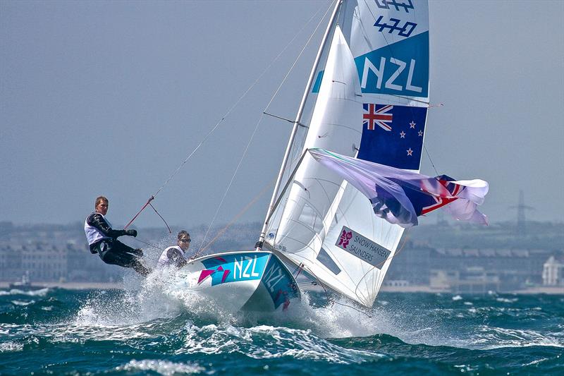 New Zealand 470 crew caught in a squall and trying to make the gybe mark - Race 1 - 2012 Olympic Regatta photo copyright Richard Gladwell - Sail-World.com/nz taken at Weymouth & Portland Sailing Academy and featuring the 470 class