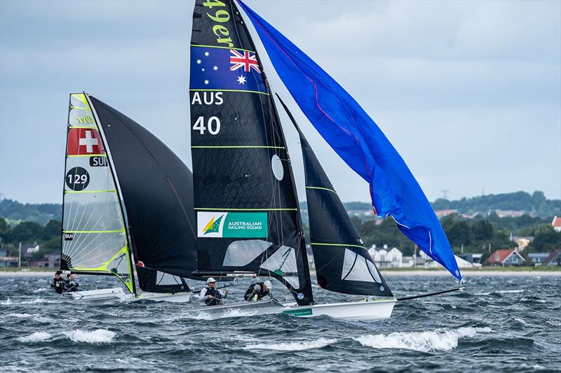Tom Needham and Joel Turner overpowering a Swiss crew - 49er, 49erFX and Nacra 17 European Championships photo copyright Beau Outteridge taken at  and featuring the 49er class