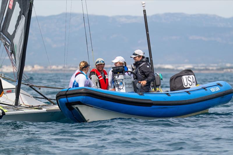 49er FX athletes Stephanie Roble and Maggie Shea receive input from USST 49erFX coach Evan Aras and skiff specialist Dave Evans between races on day five of the Trofeo Princesa Sofía photo copyright US Sailing Team taken at Real Club Náutico de Palma and featuring the 49er FX class
