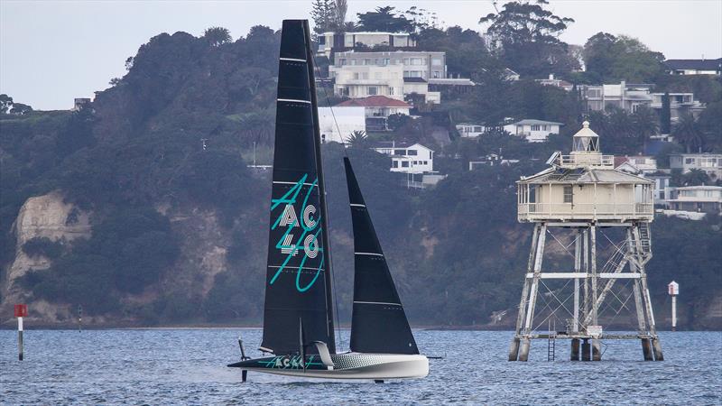 Emirates Team NZ's AC40 - passes the 150yr old Bean Rock lighthouse at the entrance to the Waitemata Harbour - September 21, 2022 photo copyright Richard Gladwell, Sail-World.com / nz taken at Royal New Zealand Yacht Squadron and featuring the AC40 class