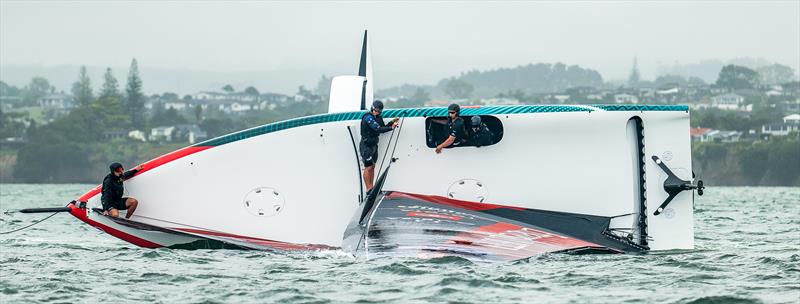 Emirates Team New Zealand - AC40 - OD capsize after striking a UFO - Hauraki Gulf - February 3, 2023 - photo © Adam Mustill / America's Cup