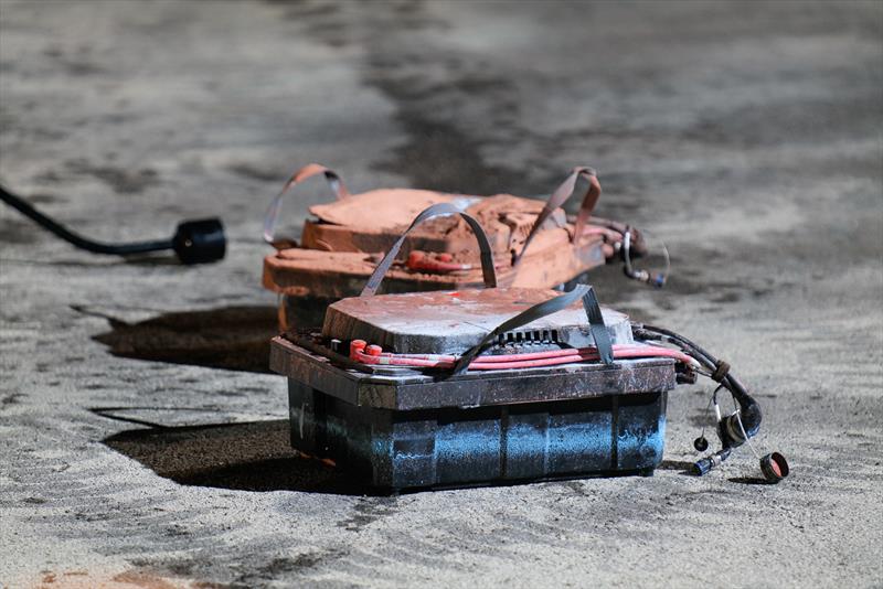 Lithium batteries on the dock - INEOS Britannia  - LEQ12 -  February 8, 2023 - Mallorca photo copyright Ugo Fonolla / America's Cup taken at Royal Yacht Squadron and featuring the AC40 class