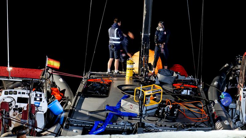 1905hrs: LEQ12 with supports boats strapped alongside - LEQ12 -  February 8, 2023 - Mallorca - photo © Ugo Fonolla / America's Cup