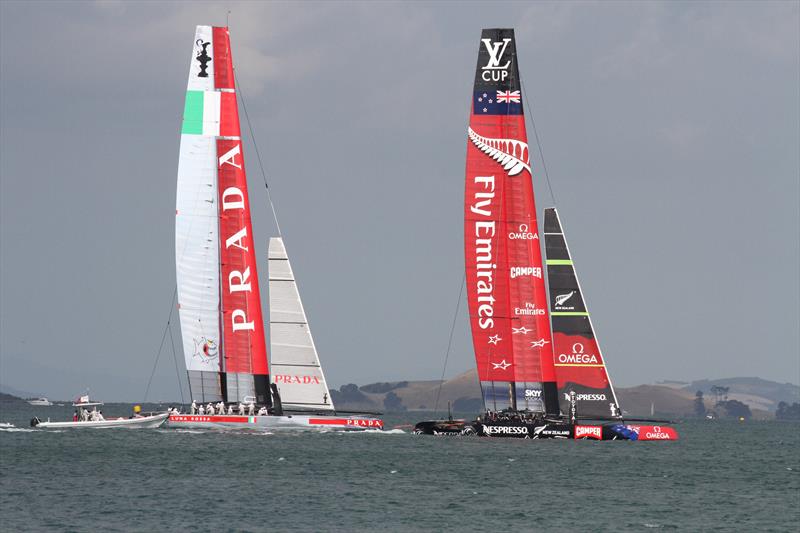In better times - Emirates Team New Zealand and Luna Rossa have a practice race in the AC72's off Takapuna Beach ahead of the 2013 America's Cup photo copyright Richard Gladwell taken at  and featuring the AC72 class
