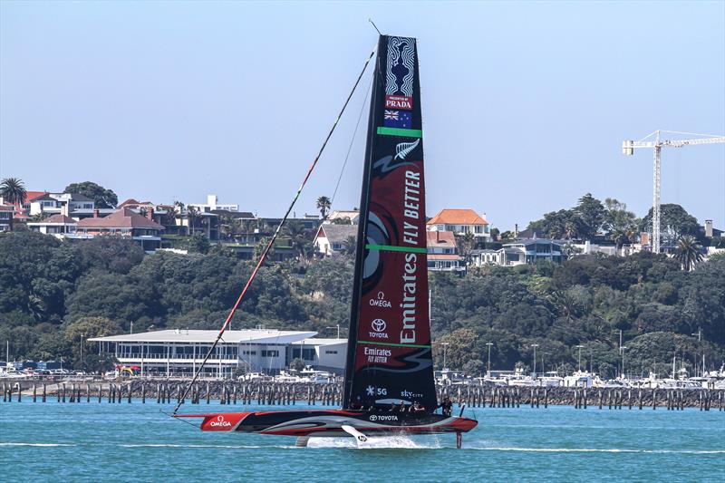 Emirates Team New Zealand's Te Aihe,  is towed past the new Hyundai Marine Sports Centre which houses the Royal Akarana Yacht Club. Waitemata Harbour, November 7, 2019 photo copyright Richard Gladwell, Sail-World.com / nz taken at Royal New Zealand Yacht Squadron and featuring the AC75 class