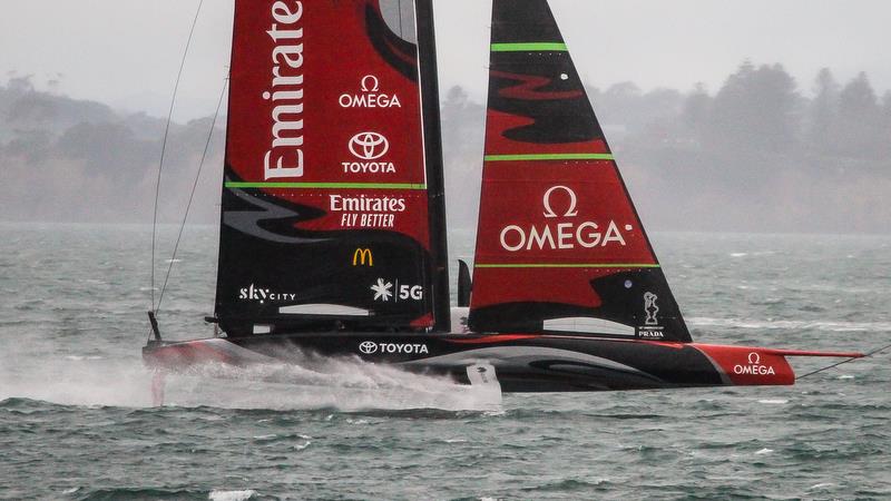 Te Aihe returns at high speed in a rain squall - Auckland - July 1, 2020 photo copyright Richard Gladwell / Sail-World.com taken at Royal New Zealand Yacht Squadron and featuring the AC75 class