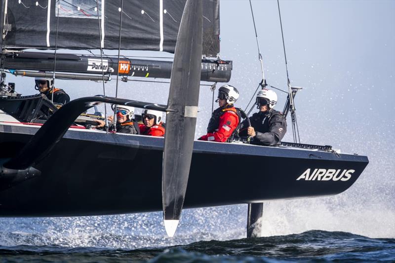 Sean Clarkson (third from right) on board American Magic's 38ft training boat, The Mule, with Dean Barker at the wheel (right).  - photo © Amory Ross