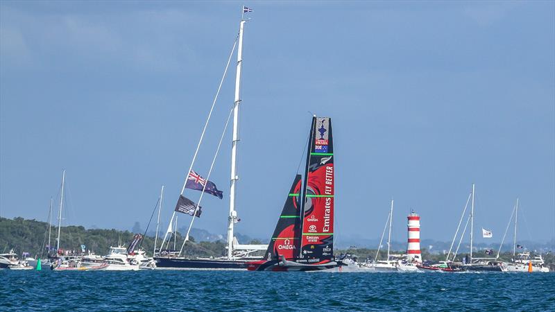 Emirates Team NZ sails past Imagine on which the Notice of Challenges was issued after the finish of Race 10 of the 36th America's Cup - Day 7 - March 17, 2021 photo copyright Richard Gladwell / Sail-World.com / nz taken at Royal New Zealand Yacht Squadron and featuring the AC75 class