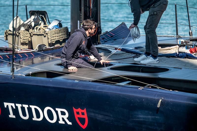 Support crew climbs into cyclist pit - AC75 - Alinghi Red Bull Racing - March 1, 2023 - Barcelona - photo © Alex Carabi / America's Cup