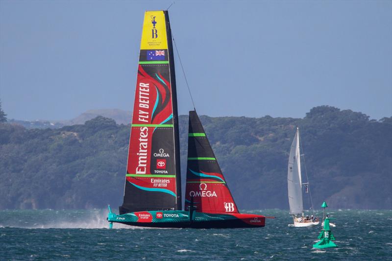 Emirates Team New Zealand passes ahead of NZ's first major international trophy winner - Rainbow II - winner of the One Ton Cup in 1969  - Waitemata Harbour - April 3, 2023 - photo © Richard Gladwell / Sail-World.com/nz