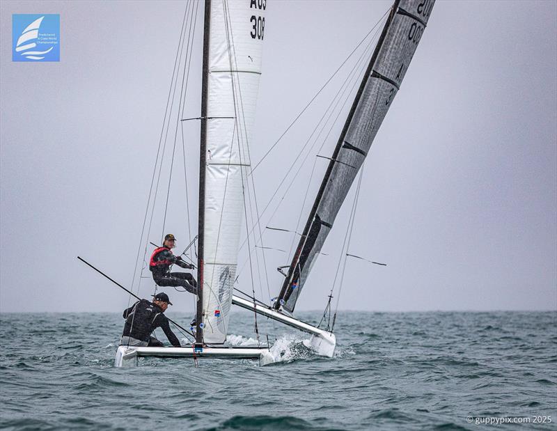 PredictWind A-Class Cat Worlds 2025 Day 3 - The son chasing the father. Andy Landenberger overatakes dad at the bottom mark - photo © Gordon Upton / www.guppypix.com