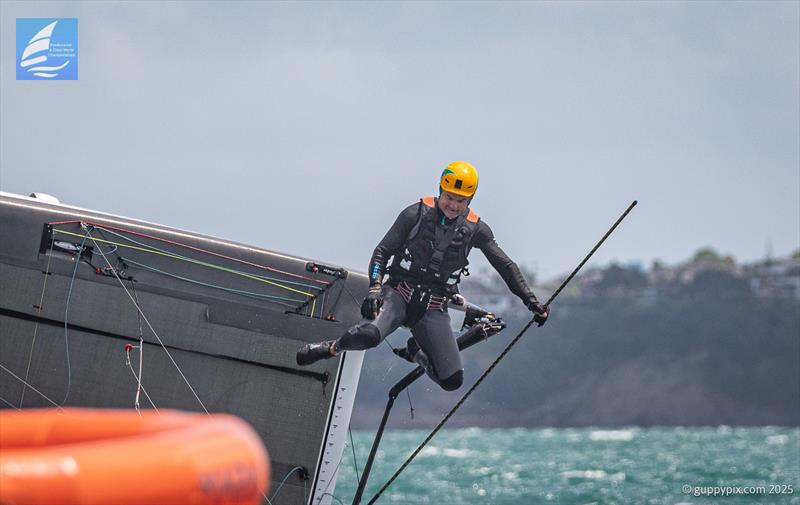 PredictWind A-Class Cat Worlds 2025 Day 4 - Bundy Bails. Darren Bundock at the last race top mark leaving his boat - photo © Gordon Upton / www.guppypix.com