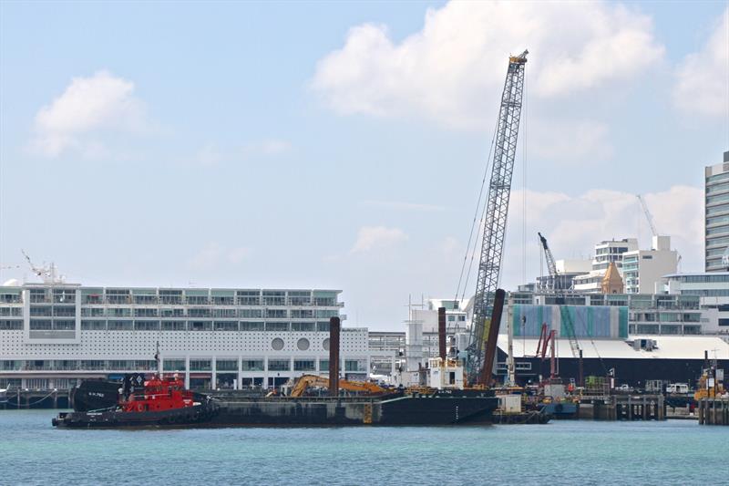 Barge and crane at work on Hobson Wharf extensions for Luna Rossa base - America's Cup bases - January 30, 2019 photo copyright Richard Gladwell taken at  and featuring the ACC class