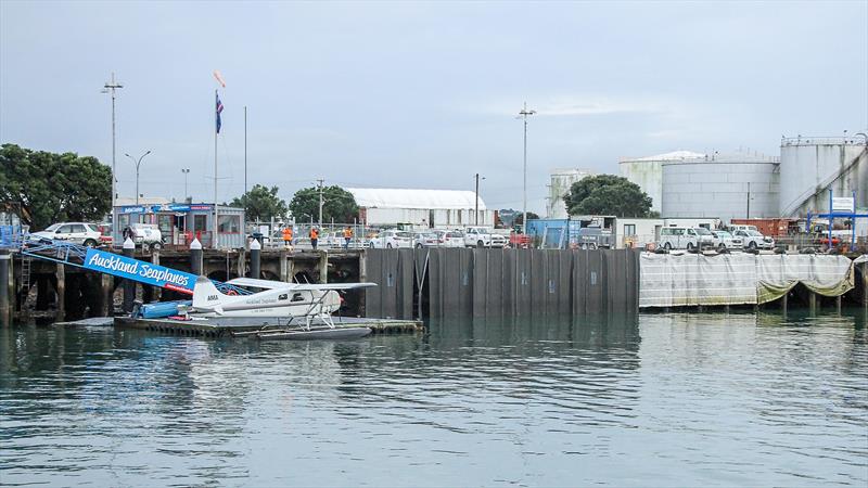 Noise deadening sheets (black) to reduce noice emission  from concrete blasting - Wynyard Point - America's Cup base development - Wynyard Edge Alliance - Update March 28, 2019  - photo © Richard Gladwell