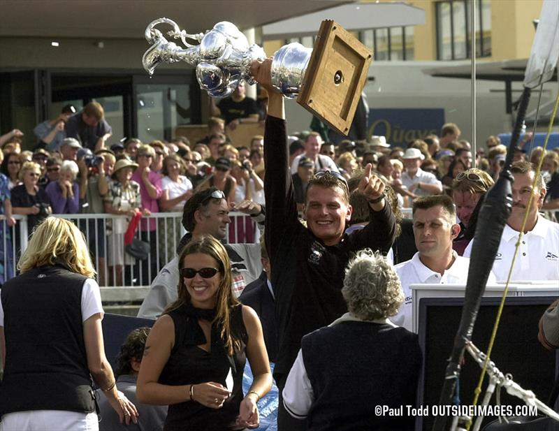 Dean Barker holds the America's Cup aloft winning in Race 5- 2000 America's Cup - March 2000 - Waitemata Harbour - Auckland - NZ photo copyright Paul Todd/Outside Images taken at Royal New Zealand Yacht Squadron and featuring the ACC class