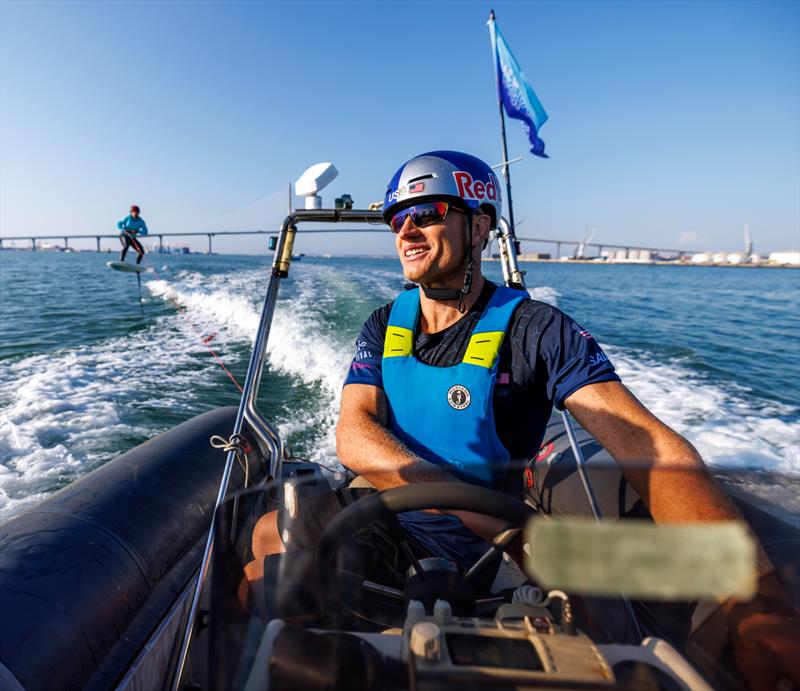 Jimmy Spithill, CEO & driver of USA SailGP Team, drives the boat as young sailors in the SailGP Inspire program try out the Armstrong foil board ahead of the Spain Sail Grand Prix in Cadiz, Andalusia, Spain. 22nd September photo copyright Felix Diemer/SailGP taken at Royal New Zealand Yacht Squadron and featuring the  class