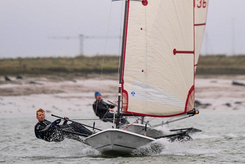 Charlie Matthews leads Malcolm Hutchings in the first race - second week of the RCYC Snow Globe photo copyright Petru Balau Sports Photography / sports.hub47.com taken at Royal Corinthian Yacht Club, Burnham and featuring the Blaze class