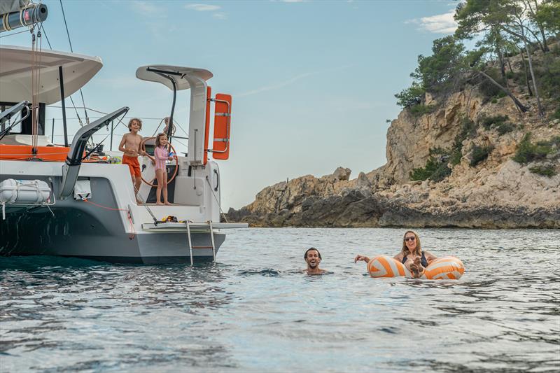 Excess 13 Swim platform down for chill time, up for party time photo copyright Yann Riou taken at  and featuring the Catamaran class