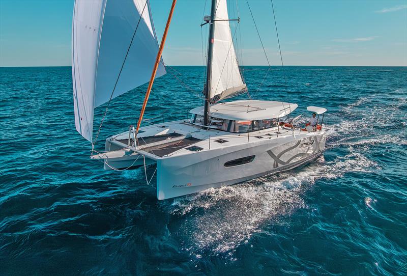 Crack on - Excess 13 with Pulse Line black stick, stanchions, and note the fixed bimini photo copyright Yann Riou taken at  and featuring the Catamaran class