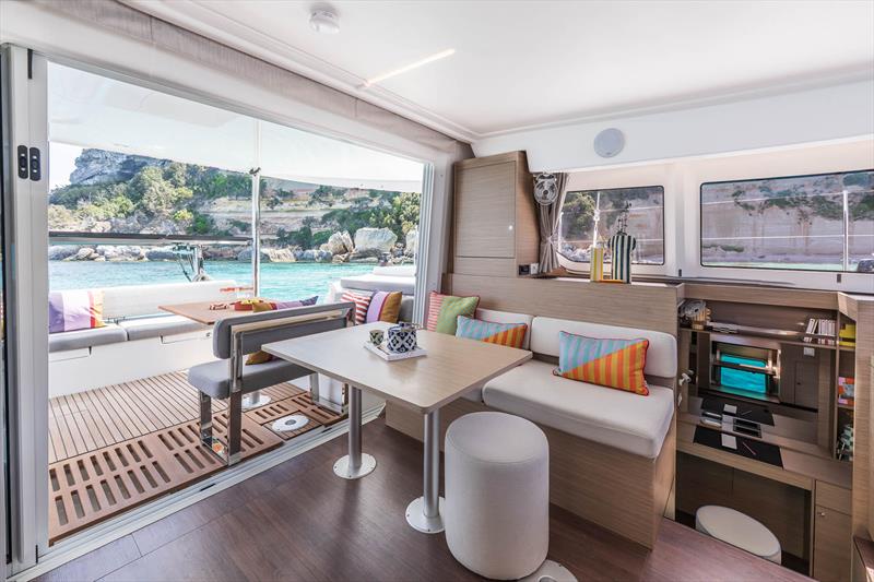 Lagoon 38 interconnectivity inside and out allows for the long lunch or intimate coffee table inside - your call photo copyright Julien Gazeau taken at  and featuring the Catamaran class