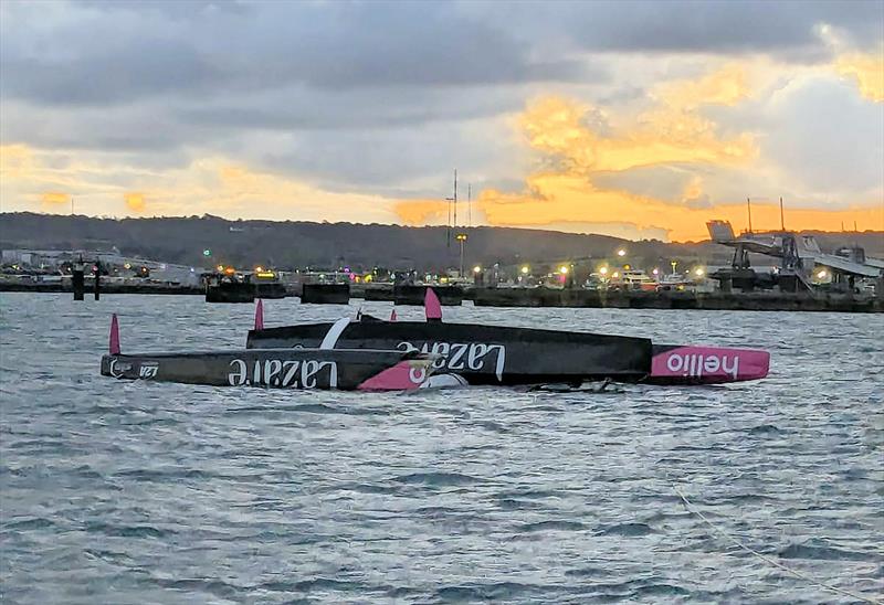 The capsized OCEAN 50 Lazare soon after the start of the Transat Café L'or Le Havre Normandie 2025 - photo © Lazare Sailing Team