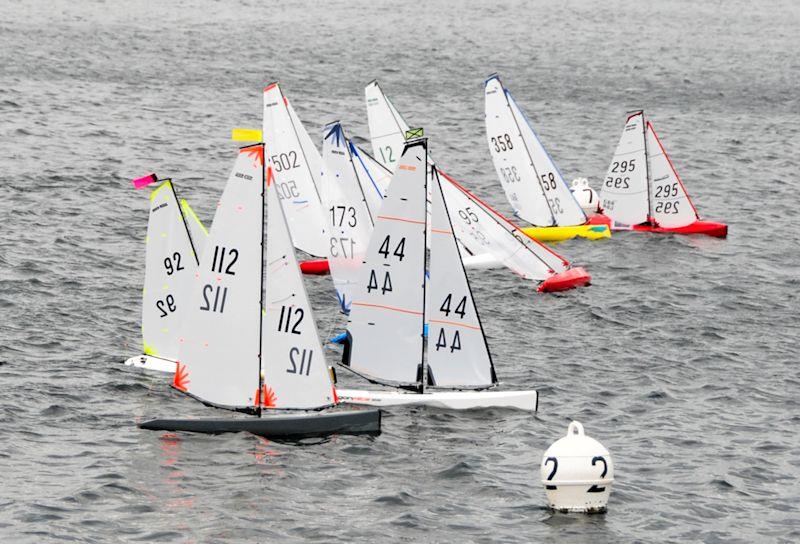 Simon Collyer 295 gets away with a port tack start - DF95 Ash Trophy at Guildford (Abbey Meads) photo copyright Roger Stollery taken at Guildford Model Yacht Club and featuring the DF95 class