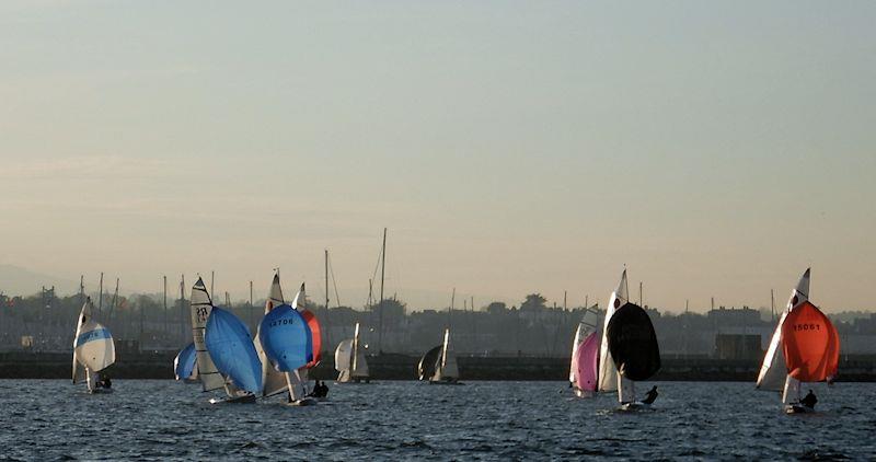 Dun Laoghaire Frostbite Series day 5 - the RS400 of Phelan & Leddy mixes it with the Fireballs - photo © Cormac Bradley