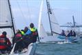 White and her Harken Youth International team chasing down Jack Littlechild's CYCA team