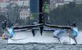 New Zealand SailGP Team helmed by interim driver Nathan Outteridge sails in front of USA SailGP Team on Race Day 1 of the KPMG Australia Sail Grand Prix in Sydney,