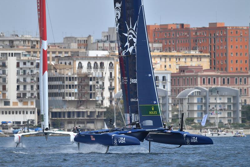 USA SailGP Team helmed by Jimmy Spithill ahead of Japan SailGP Team helmed by Nathan Outterridge in the final race of race day 2. Italy SailGP, Event 2, Season 2 in Taranto, Italy. 06 June .  - photo © Ricardo Pinto / SailGP