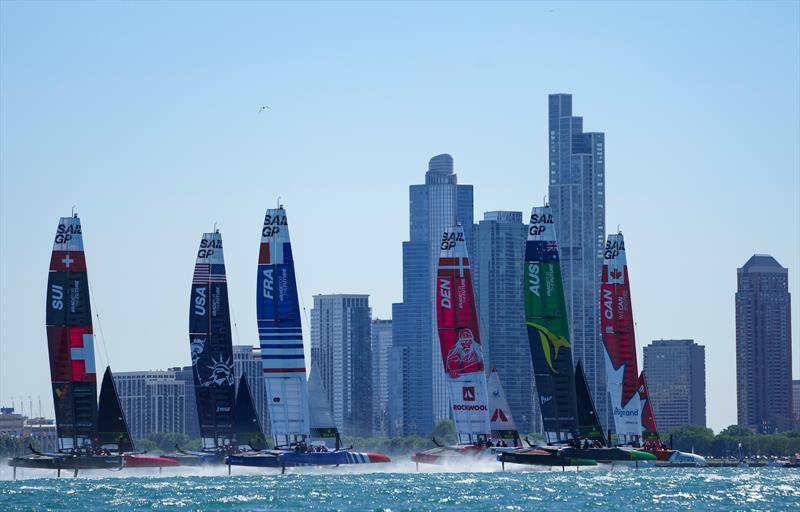 The fleet sail past the Chicago skyline on Race Day 1 of the T-Mobile United States Sail Grand Prix | Chicago at Navy Pier, Lake Michigan, Season 3, in Chicago, Illinois, USA.June 2022 photo copyright Chloe Knott/SailGP taken at Chicago Yacht Club and featuring the F50 class