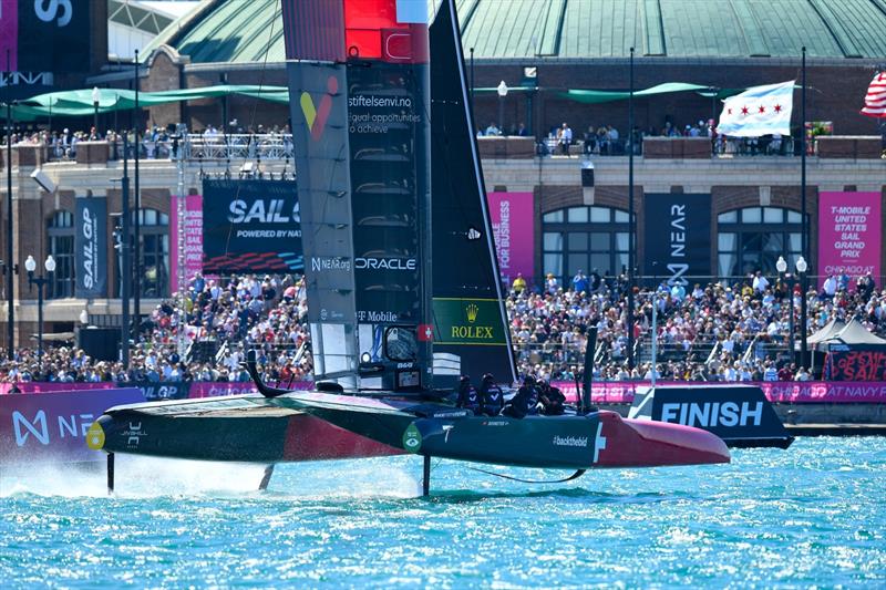 The Switzerland SailGP Team, helmed by Sébastien Schneiter, sail past spectators at Navy Pier on Race Day 1 of the T-Mobile United States Sail Grand Prix | Chicago at Navy Pier photo copyright SailGP taken at  and featuring the F50 class