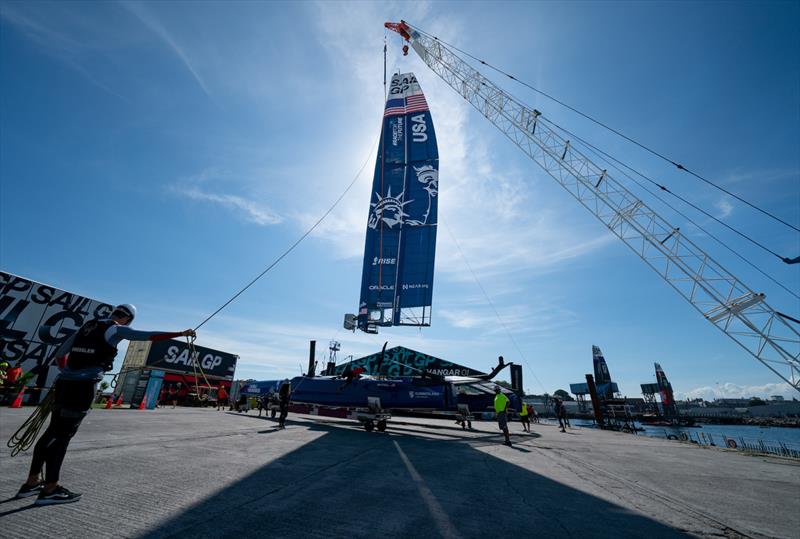 The wing of the USA SailGP Team F50 catamaran is lifted by crane in the Technical Base after a practice session ahead of the Great Britain Sail Grand Prix | Plymouth in Plymouth, England. 29th July 2022 photo copyright Jon Super/SailGP taken at Royal Plymouth Corinthian Yacht Club and featuring the F50 class