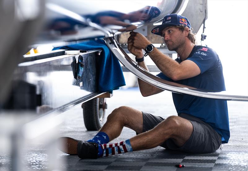 Hans Henken, flight controller of USA SailGP Team, helps prepare the USA SailGP Team F50 catamaran prior to racing on Race Day 1 of the Great Britain Sail Grand Prix | Plymouth photo copyright Ricardo Pinto for SailGP taken at  and featuring the F50 class