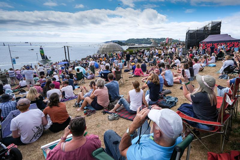 Fans watch the racing action from the Fan Village in Hoe Park on Race Day 1 of the Great Britain Sail Grand Prix | Plymouth photo copyright Ian Roman for SailGP taken at  and featuring the F50 class