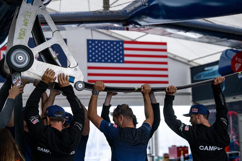 Crew members help prepare the USA SailGP Team F50 catamaran at the Technical Base prior to racing on Race Day 2 of Great Britain Sail Grand Prix | Plymouth photo copyright Ricardo Pinto for SailGP taken at  and featuring the F50 class