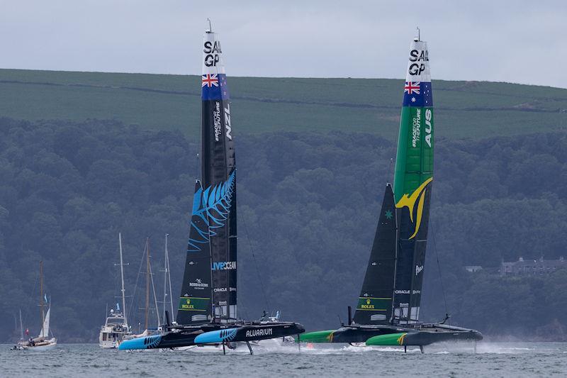 New Zealand SailGP Team co-helmed by Peter Burling and Blair Tuke battle with Australia SailGP Team helmed by Tom Slingsby on Race Day 2 of the Great Britain Sail Grand Prix | Plymouth photo copyright David Gray for SailGP taken at  and featuring the F50 class