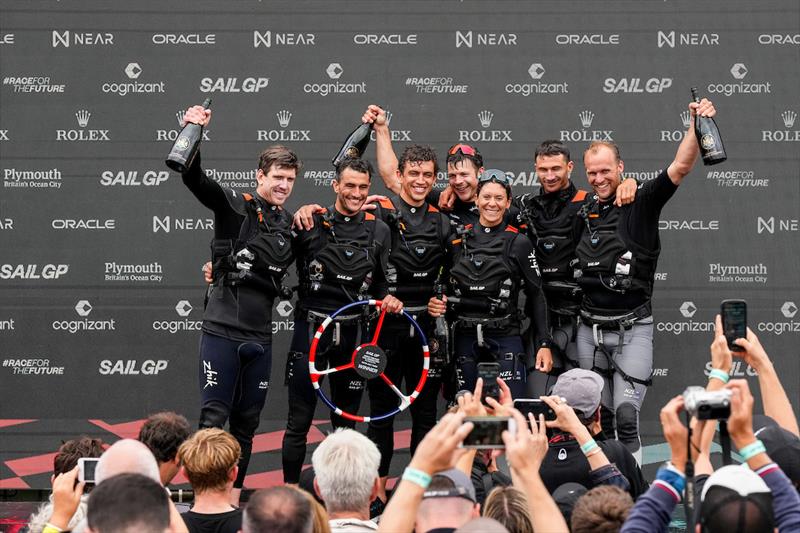 New Zealand SailGP Team celebrate on stage after winning the Great Britain Sail Grand Prix | Plymouth in Plymouth, England. 31st July  photo copyright Ian Roman/SailGP taken at Royal Plymouth Corinthian Yacht Club and featuring the F50 class