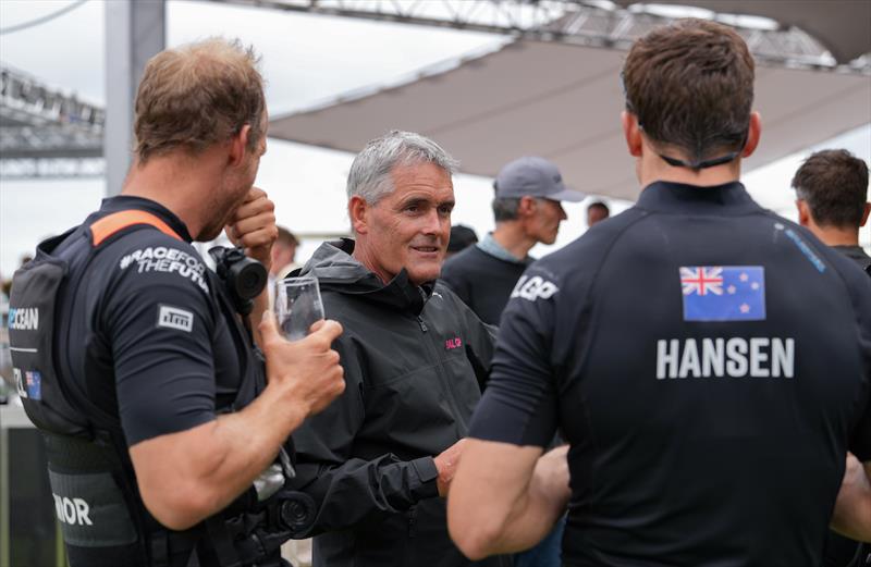 Sir Russell Coutts, SailGP CEO, talks to Marcus Hansen and Josh Junior, grinder of New Zealand SailGP Team, in the Adrenaline Lounge on Race Day 2 of the Great Britain Sail Grand Prix | Plymouth in Plymouth, England. 31st July, 2022 photo copyright Andrew Baker for SailGP taken at Royal Plymouth Corinthian Yacht Club and featuring the F50 class