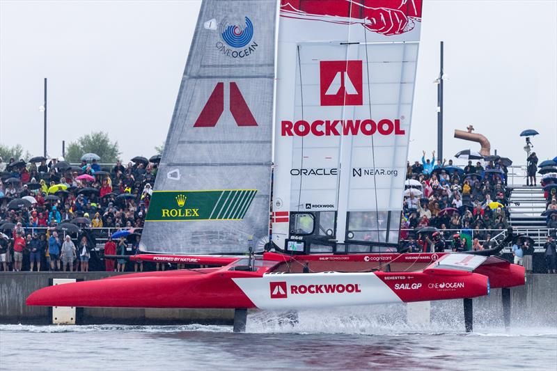 The Rockwool Denmark SailGP Team are towed past the spectators in the Race Village prior to racing on Race Day 1 of the Rockwool Denmark Sail Grand Prix in Copenhagen, Denmark photo copyright Felix Diemer/SailGP taken at Royal Danish Yacht Club and featuring the F50 class