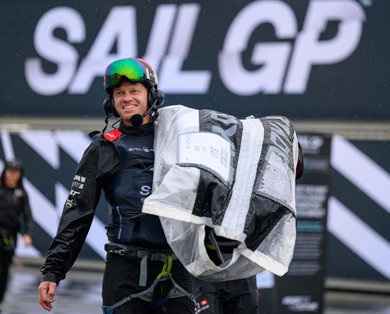 Nathan Outteridge, co-driver and sailing advisor of Switzerland SailGP Team, helps carry the team's Doyle Sails back across the Technical Base - SailGP Denmark - photo © Jon Buckle/SailGP