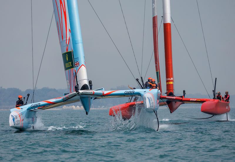 Great Britain SailGP Team helmed by Ben Ainslie ahead of Spain SailGP Team helmed by Jordi Xammar in light winds on Race Day 1 of the Singapore Sail Grand Prix presented by the Singapore Tourism Board photo copyright Ian Walton for SailGP. taken at  and featuring the F50 class