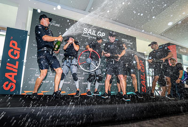 The New Zealand SailGP Team spray Champagne Barons de Rothschild in the Adrenaline Lounge to celebrate their win of the Singapore Sail Grand Prix  photo copyright Eloi Stichelbaut/SailGP. taken at Singapore Yacht Club and featuring the F50 class