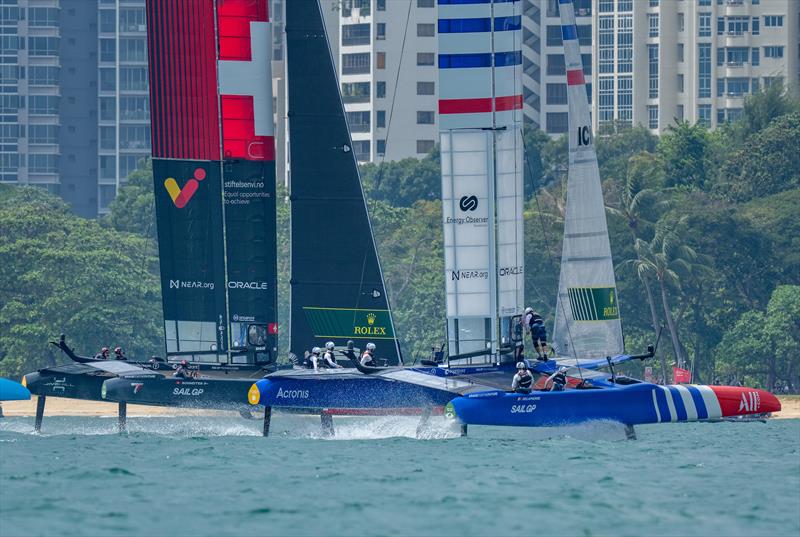 Switzerland SailGP Team in action with France SailGP Team on Race Day 2 of the Singapore Sail Grand Prix  photo copyright Eloi Stichelbaut/SailGP. taken at Singapore Yacht Club and featuring the F50 class