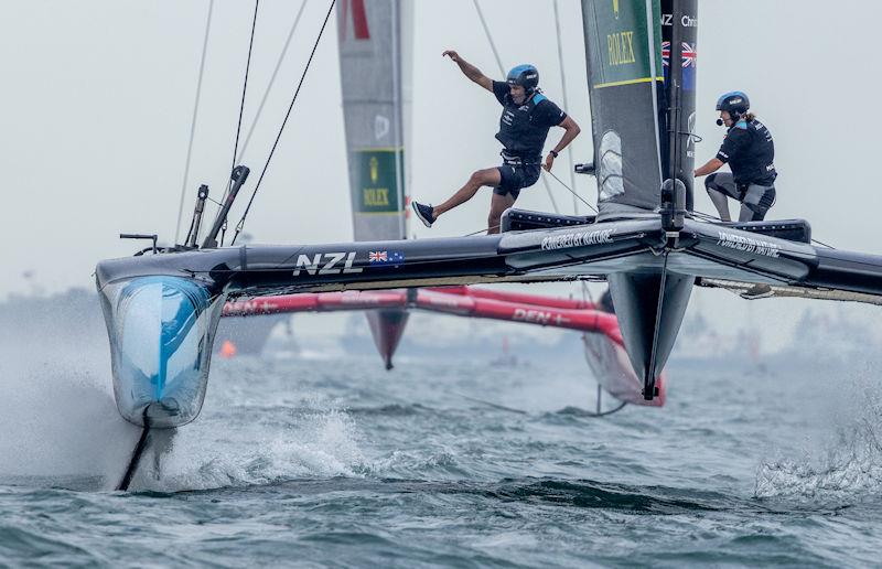 New Zealand SailGP Team helmed by Peter Burling in action with Denmark SailGP Team presented by ROCKWOOL on Race Day 2 of the Singapore Sail Grand Prix presented by the Singapore Tourism Board photo copyright Felix Diemer for SailGP taken at  and featuring the F50 class