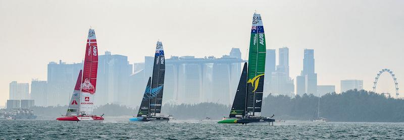 Denmark SailGP Team presented by ROCKWOOL, New Zealand SailGP Team and Australia SailGP Team in action with the city skyline in the background on Race Day 2 of the Singapore Sail Grand Prix photo copyright Eloi Stichelbaut for SailGP taken at  and featuring the F50 class