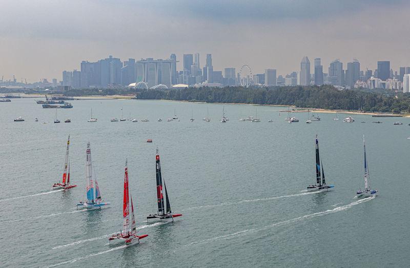 The SailGP fleet in action with the city skyline in the background on Race Day 2 of the Singapore Sail Grand Prix presented by the Singapore Tourism Board photo copyright Ian Walton for SailGP taken at  and featuring the F50 class